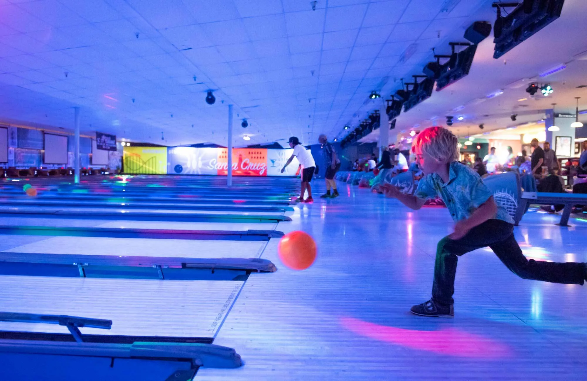 Boy bowling